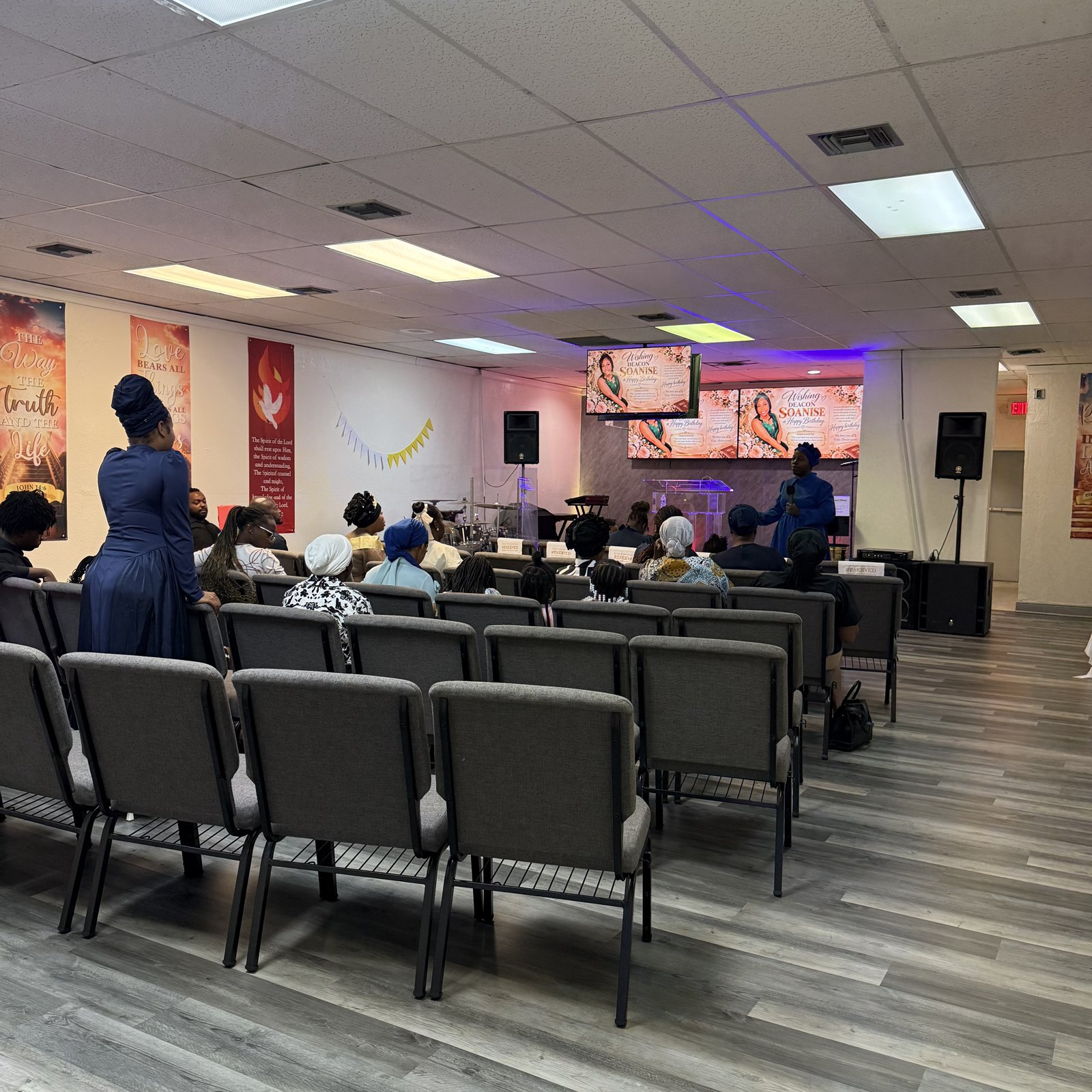 Sanctuary interior with rows of chairs facing the worship platform